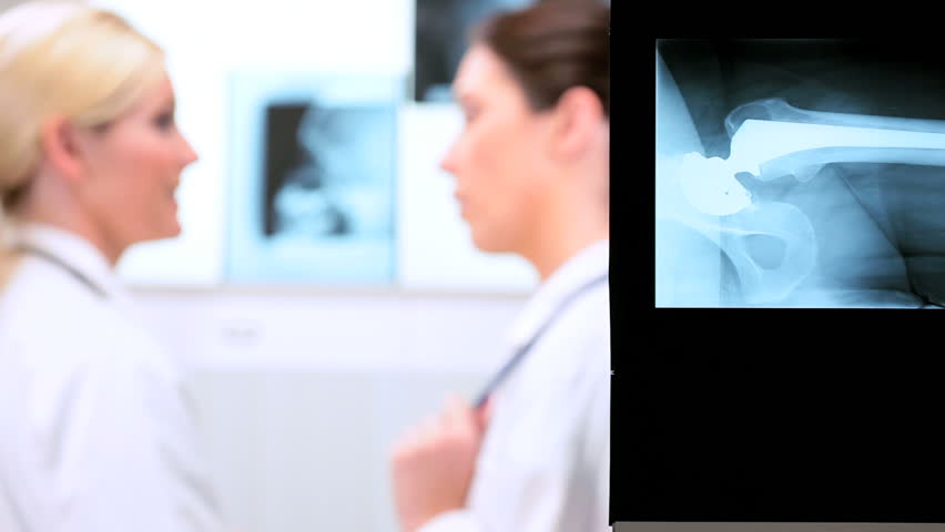 Two Female Caucasian Doctors Examining Stock Footage Video 100 Royalty Free 1928881 Shutterstock Two Female Caucasian Doctors Examining Stock Footage Video 100 Royalty Free 1928881 Shutterstock