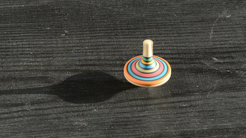 Colorful Wooden Top On The Stock Footage Video 100 Royalty Free Colorful Wooden Top On The Old Black Table