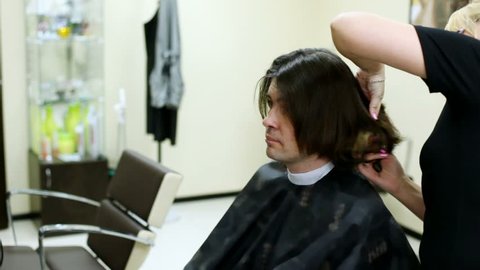 Hairdresser Cuts Hair To Man Stock Footage Video 100 Royalty