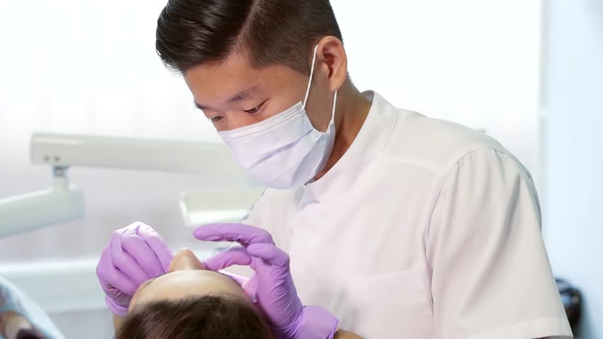 Dentist Asian Treats The Patient Stock Footage Video 100 Royalty Free 20375941 Shutterstock