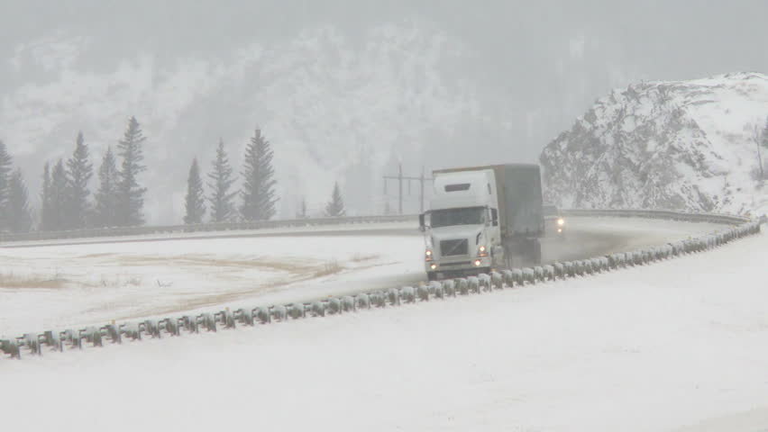 Reveal, Rolled Semi Truck In Ditch, Winter Snow Storm Stock Footage ...