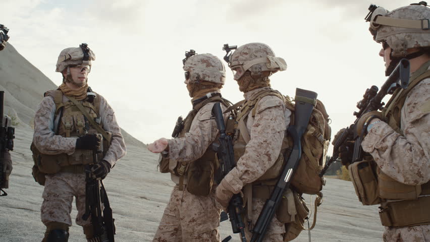 Group Of Soldiers Are Standing In A Circle And Listening Orders From ...