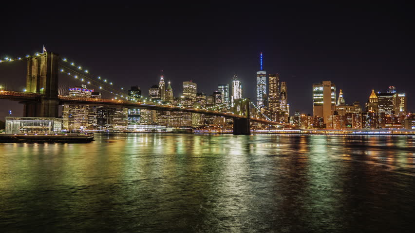 Beautiful View Of Manhattan Skyline And Brooklyn Bridge At Night. Time ...