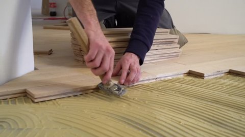 Carpenter Worker Installing Wood Parquet Stock Footage Video 100