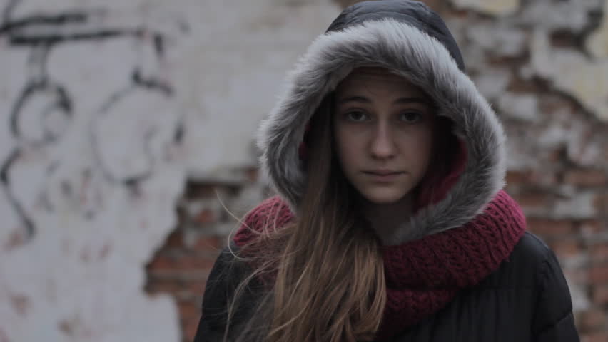 Sad Depression: Cute Young Girl Wearing Fur Hood Up And Scarf Looks ...