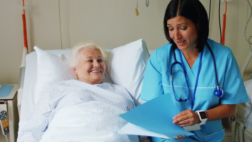 Portrait Elderly Female Patient Hospital Bed Being Reassured By Medical ...