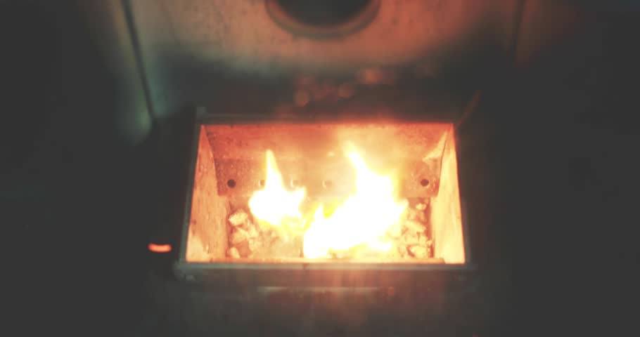 Video Of A Pellet Stove With The Wood Pellets Just Starting To Burn