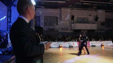 Poltava, Ukraine, Dec 2016 : A lot of couples dancing passionate Latin dance in the ballroom.