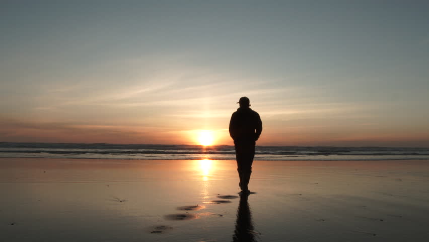 Slow Motion Close Up Silhouette Cheerful Tourist Man Standing On Beautiful Sandy Beach With Arms