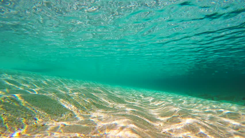 Underwater Shallow Sandy Ocean Floor With Sunlight Through Water ...