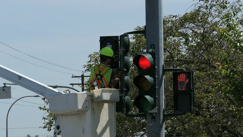 Vancouver Bc June 2018 A Traffic Light Technician Carefully Vancouver Bc Canada June 2018 A Traffic Light Technician Carefully Repairs