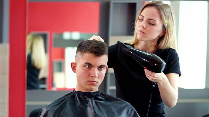 Professional Hairdresser Drying Hair In Stock Footage Video 100