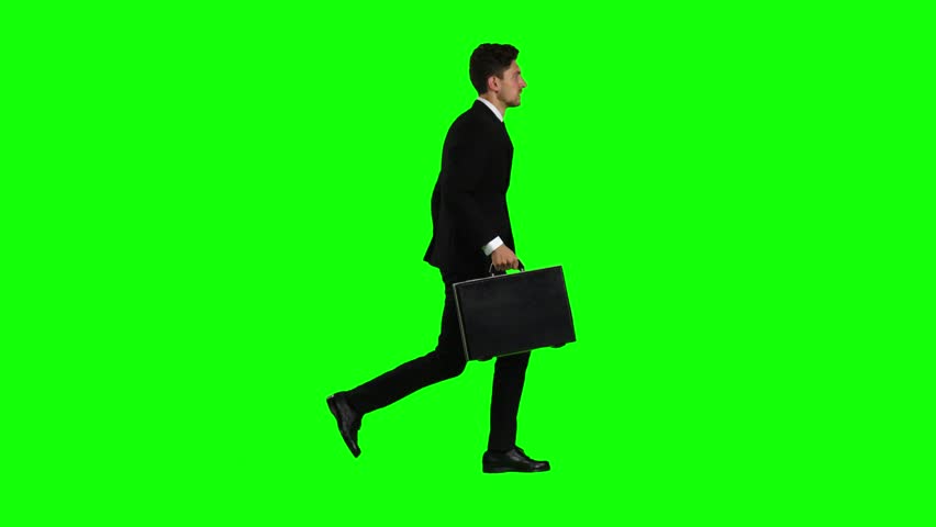 Cartoon Businessman Walking, Holding Briefcase And Talking On The Phone