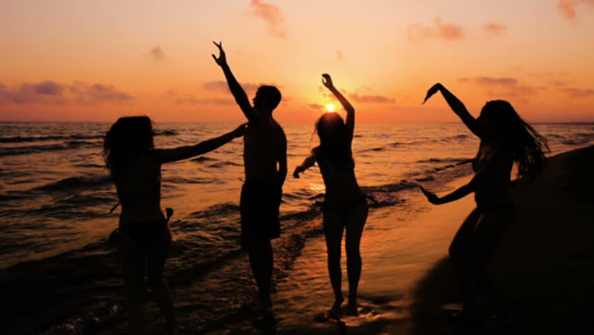 Party On The Beach. Young People Having Fun At The Evening Promenade ...