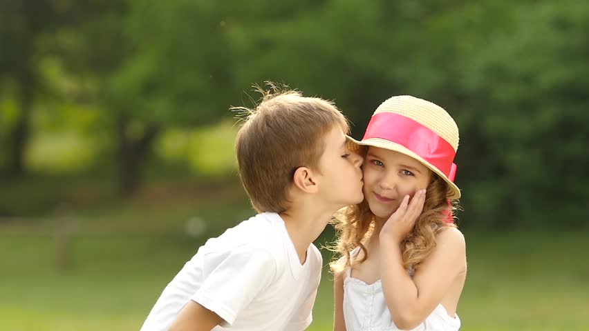 Little Boy Kisses the Girl Stock Footage Video 100