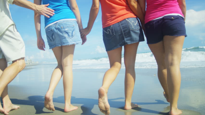 Close Crop Of Sexy Girls Wearing Denim Shorts With Butt Cheek Sticking ...