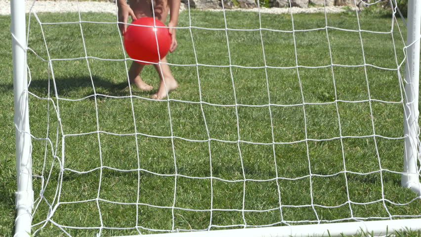 Child Playing Football On A Stock Footage Video 100 Royalty