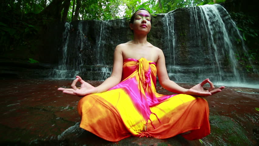 Meditating Beautiful Woman With Facial Painting In Borneo Rainforest ...