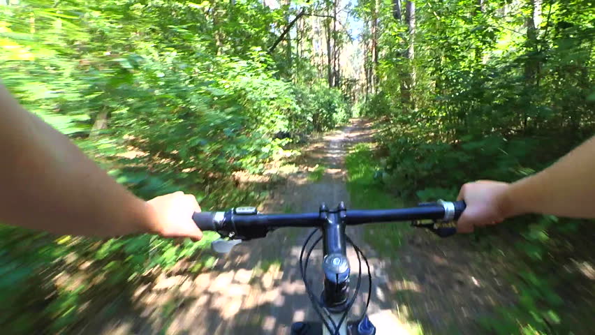 Extreme Girl Rides A Bicycle Along The River Bank. Point Of View Pov Mtb Go Pro Action Camera