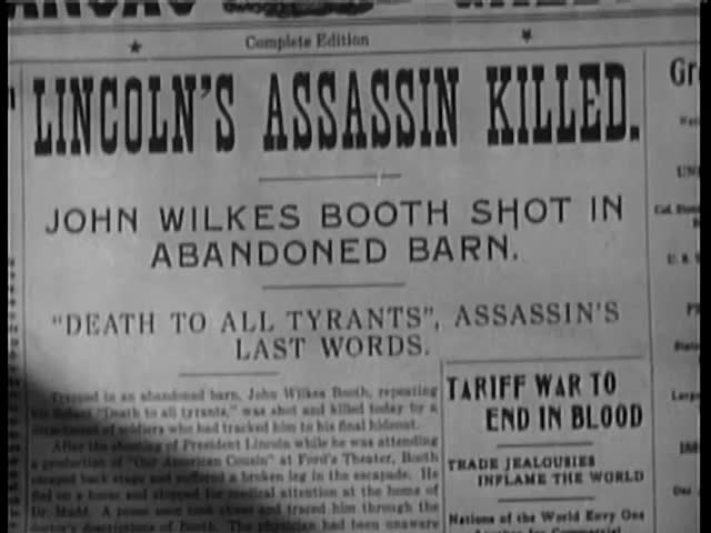 Stock Video Clip Of Close-up Of Newspaper Headline Lincoln's Assassin ...