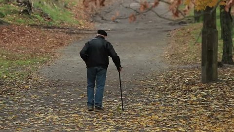 old man walking away