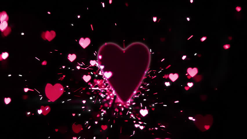 Pink Heart Confetti And Sparks Flying Against Pink Heart In Slow Motion ...