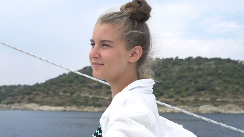 young-teen-girl-takes-short-off-slowly