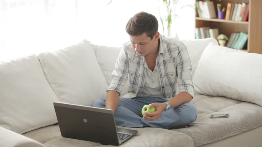 Handsome Guy Relaxing On Sofa Stock Footage Video 100 Royalty Free 4468301 Shutterstock
