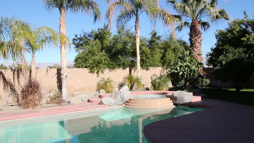 Swimming Pool And Hot Tub With Palm Trees