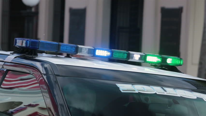 police car with green lights