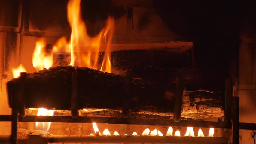 Hd00 30close Up Of A Yule Log Burning In A Fireplace