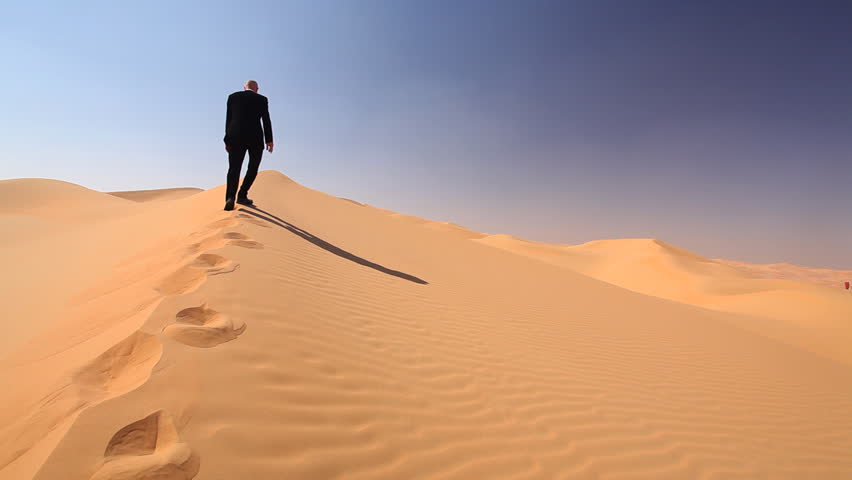 Man Walking In The Desert Stock Footage Video | Shutterstock