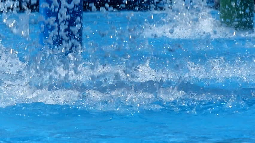 Pool Water Splash splash of water in swimming pool, slow motion stock footage video Pool Water Splash splash of water in swimming pool, slow motion stock footage video
