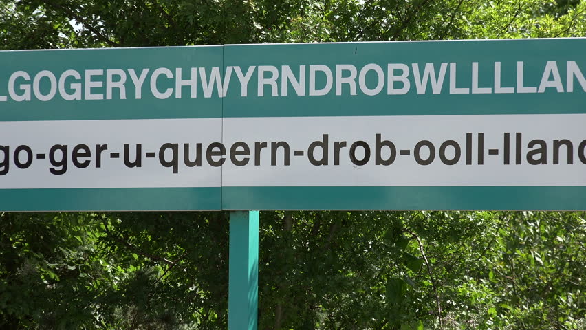 Wales Circa 2017 The Town Of Zoom Out To One Of The Longest Village Names In World Llanfairpwll Anglesey