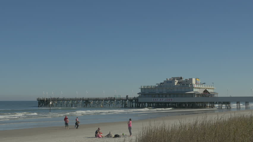 Daytona Beach Florida December Stock Footage Video 100 Royalty Daytona Beach Florida December 14 Family Building A Sandcastle On The Near Pier Fall Day 2017 In