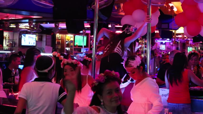 MAHMUTLAR, ALANYA, TURKEY - JUL 10, 2012: Barmen Dance On Bar At Night ...