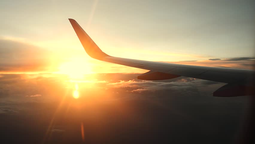 Aerial View Of Sunrise Through Airliner Window Stock ...