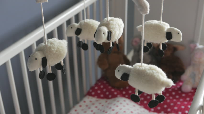 spinning baby toys above crib