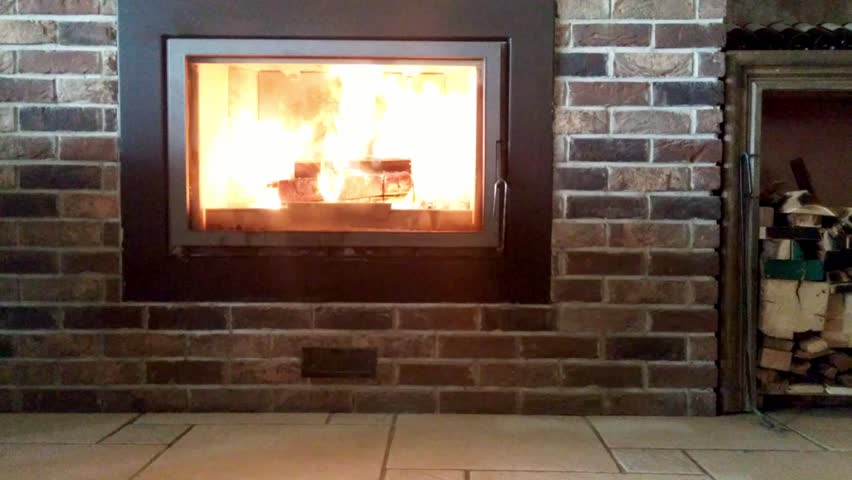 Hd00 20a Real Wood Fire Burning In A Clean Brick Fireplace Winter A Real Wood Fire Burning In Clean Brick Fireplace Winter Home Atmosphere