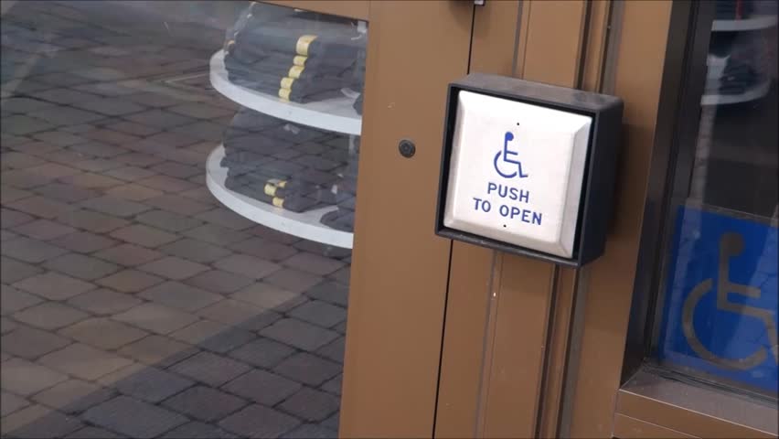 Person Pushing Handicap Button To Stock Footage Video 100