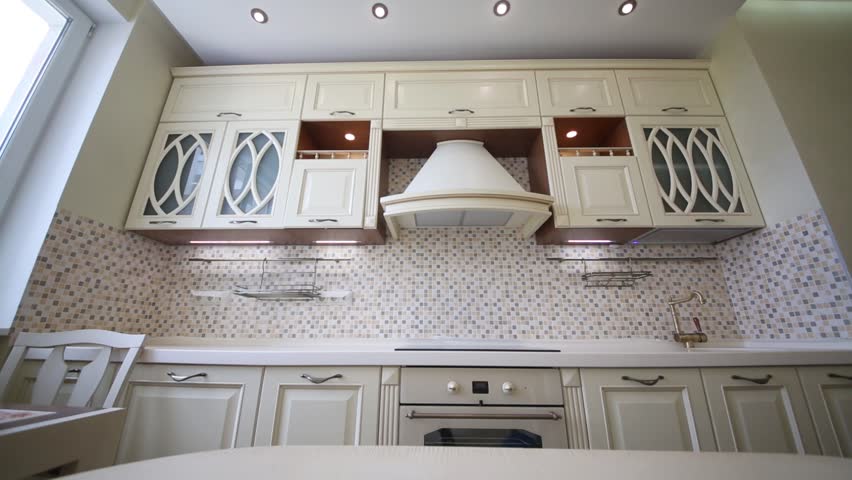 Furniture Design Videos interior of modern kitchen with beige furniture and stove stock Furniture Design Videos interior of modern kitchen with beige furniture and stove stock