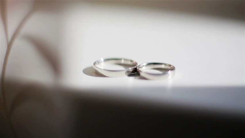 Pair Of Wedding Rings On Mirror Stock Footage Video 25121471 Of Gold Wedding Rings In Natural Light Close Up Hd Stock Footage