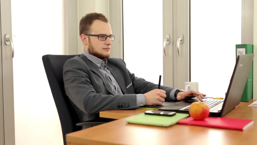 Young Handsome Man Sitting Behind Stockvideos Filmmaterial